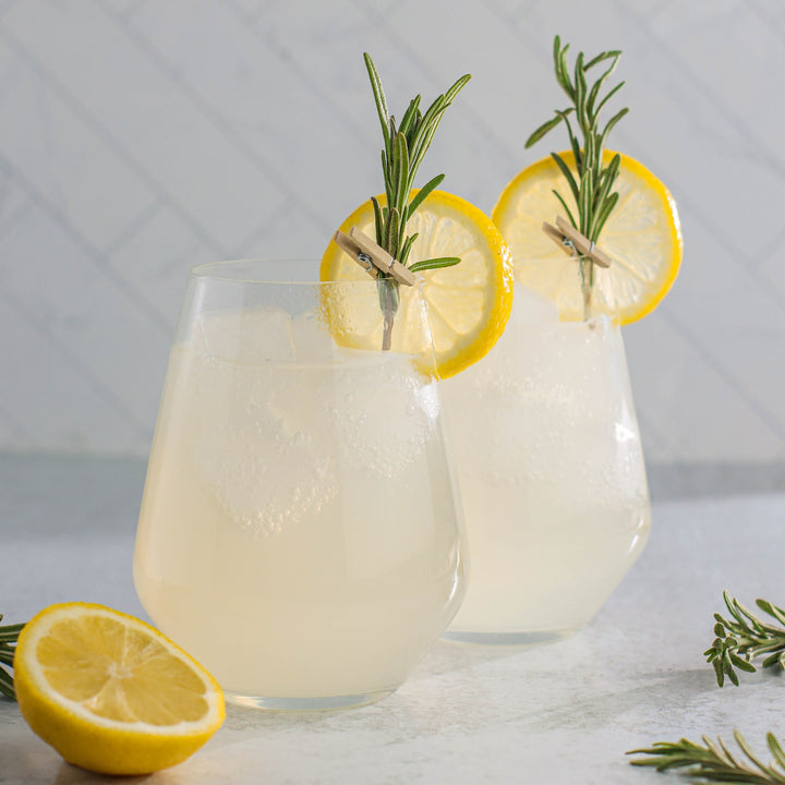 Stemless profile with a stable base provides comfort in hand and helps reduce spills.